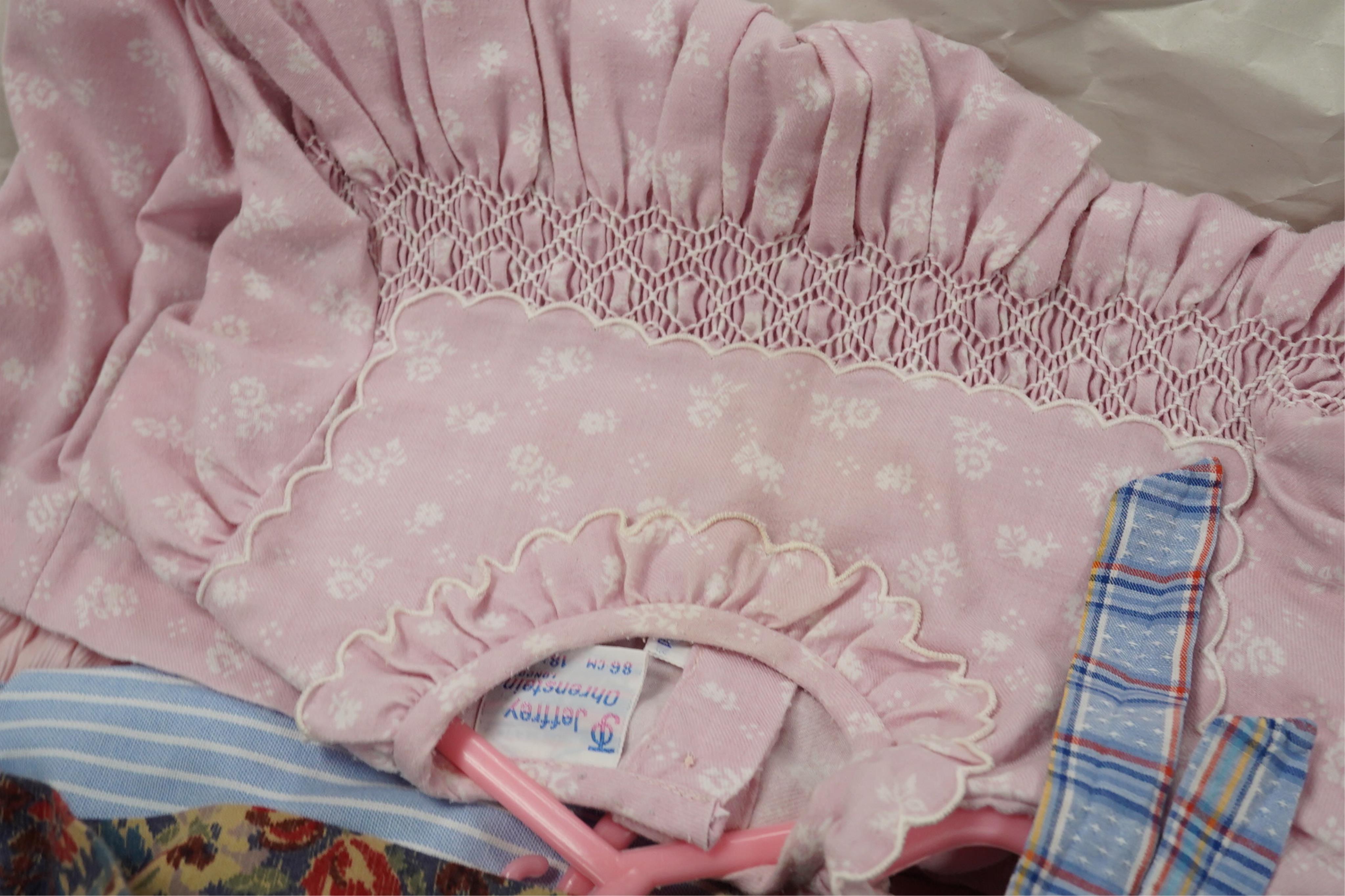 Twelve assorted 1980’s vintage children's dresses up to age eight, some hand smocked to include Harrods Belart, Chantel (including bell in hem), Michael de Leon, Heskia